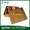 Luxury high end gold cardboard cosmetic packaging box wholesale with gold satin